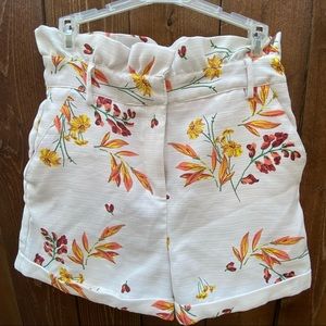 GB shorts; white with bright floral accents
